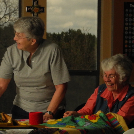 Two women quilting