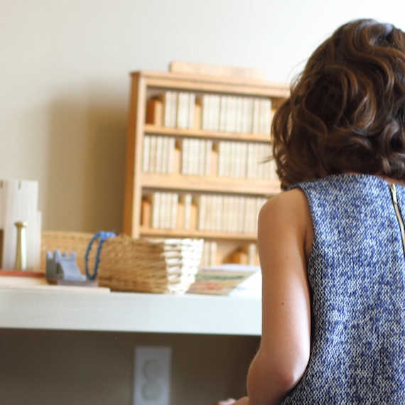 Child sitting at table